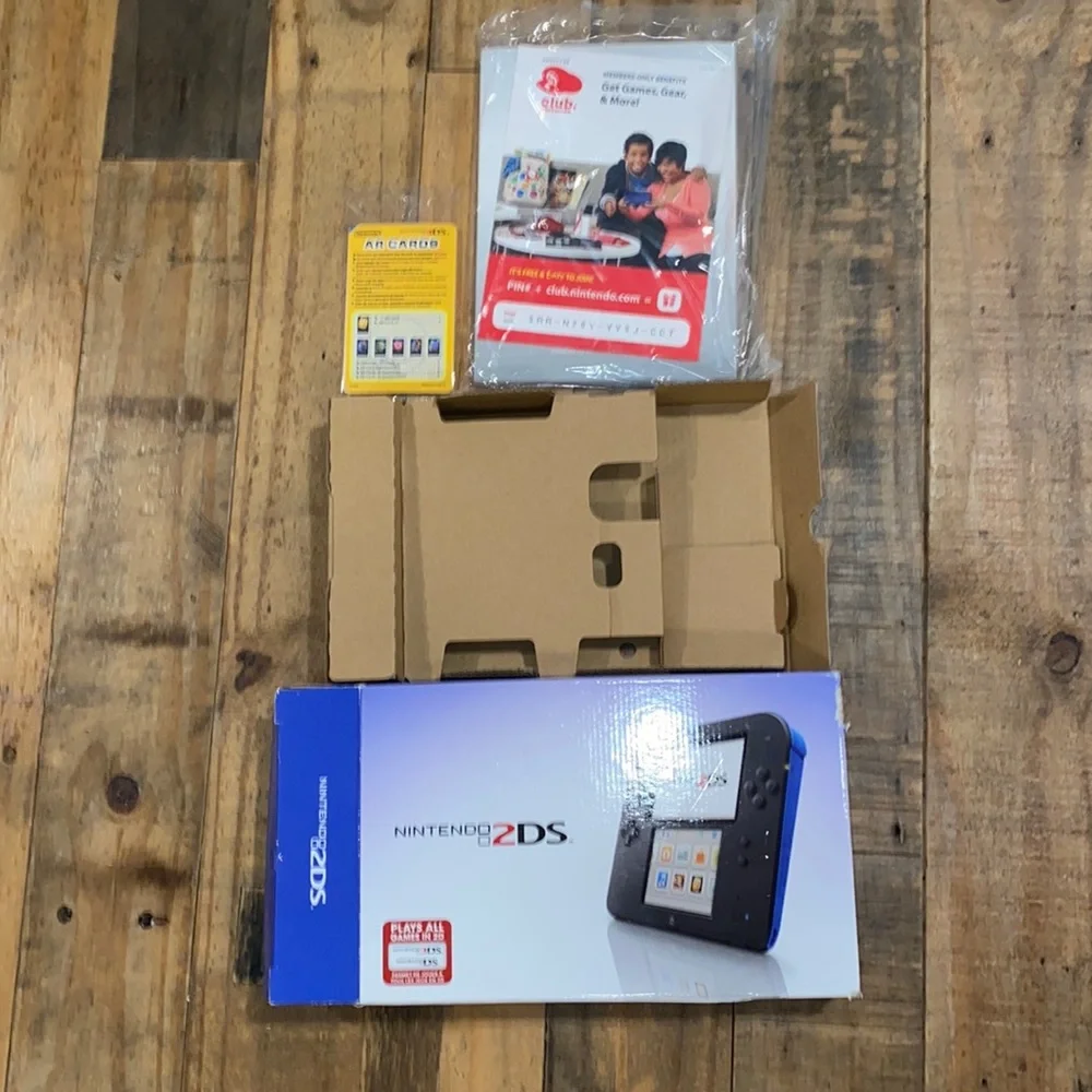 Nintendo DS electric blue box with instructions. No game console